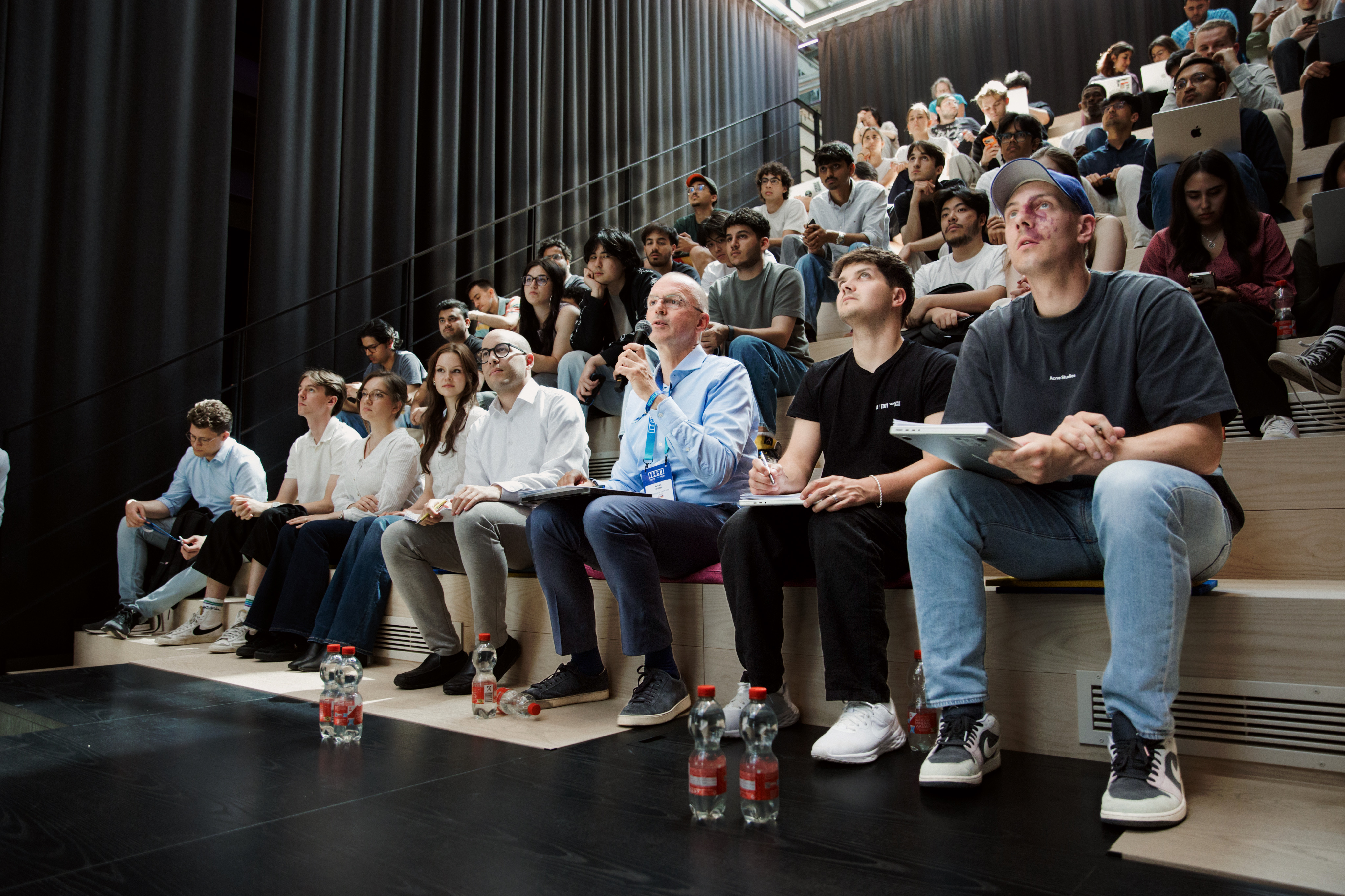 A co-founder taking a question from the audience